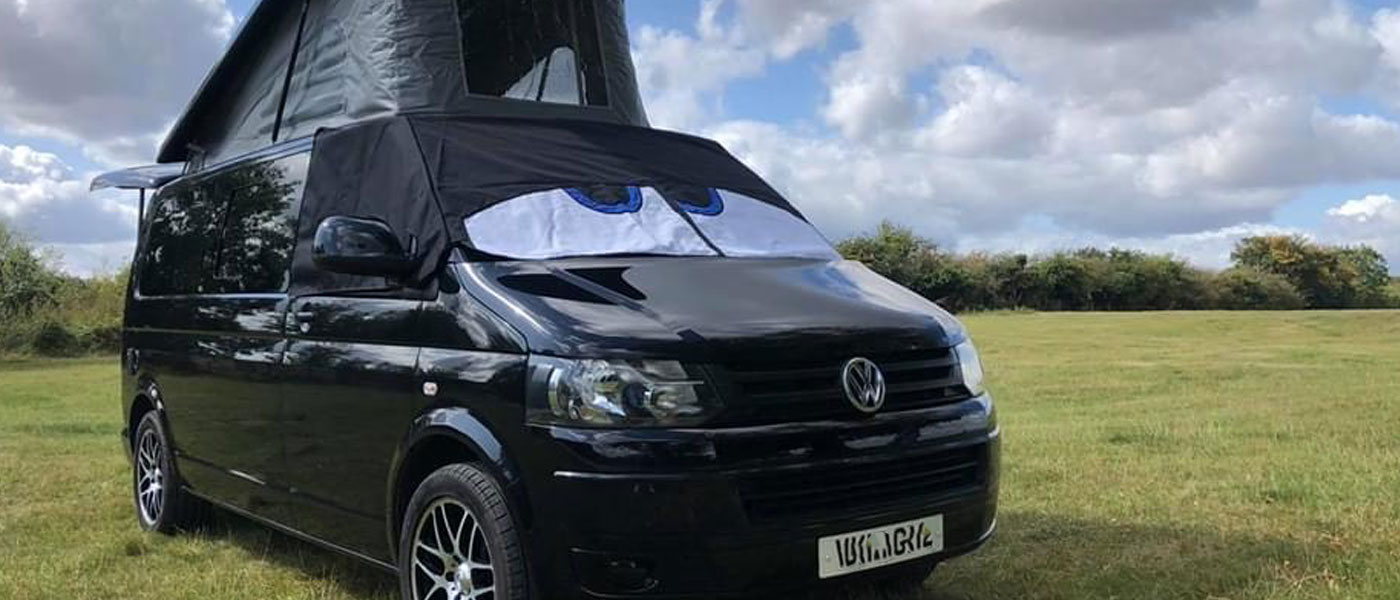 VW T5 campervan fitted with a Black BusEyes windscreen cover