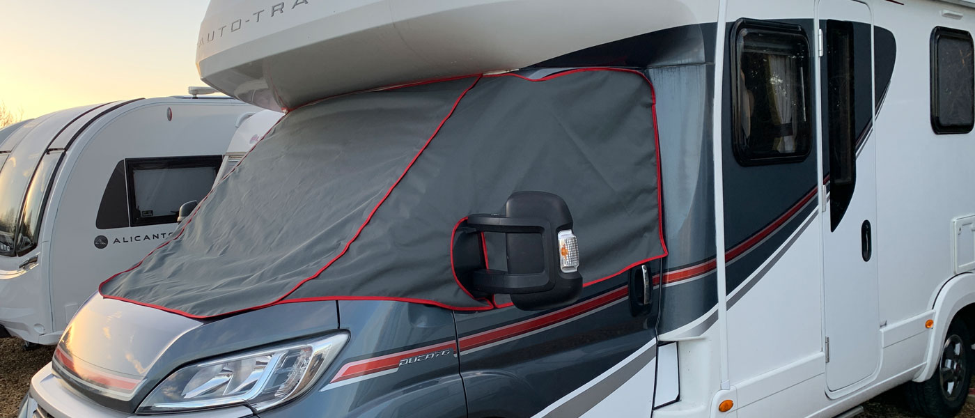 Fiat Ducato based motorhome fitted with an extended front bonnet section wrap around windscreen cover