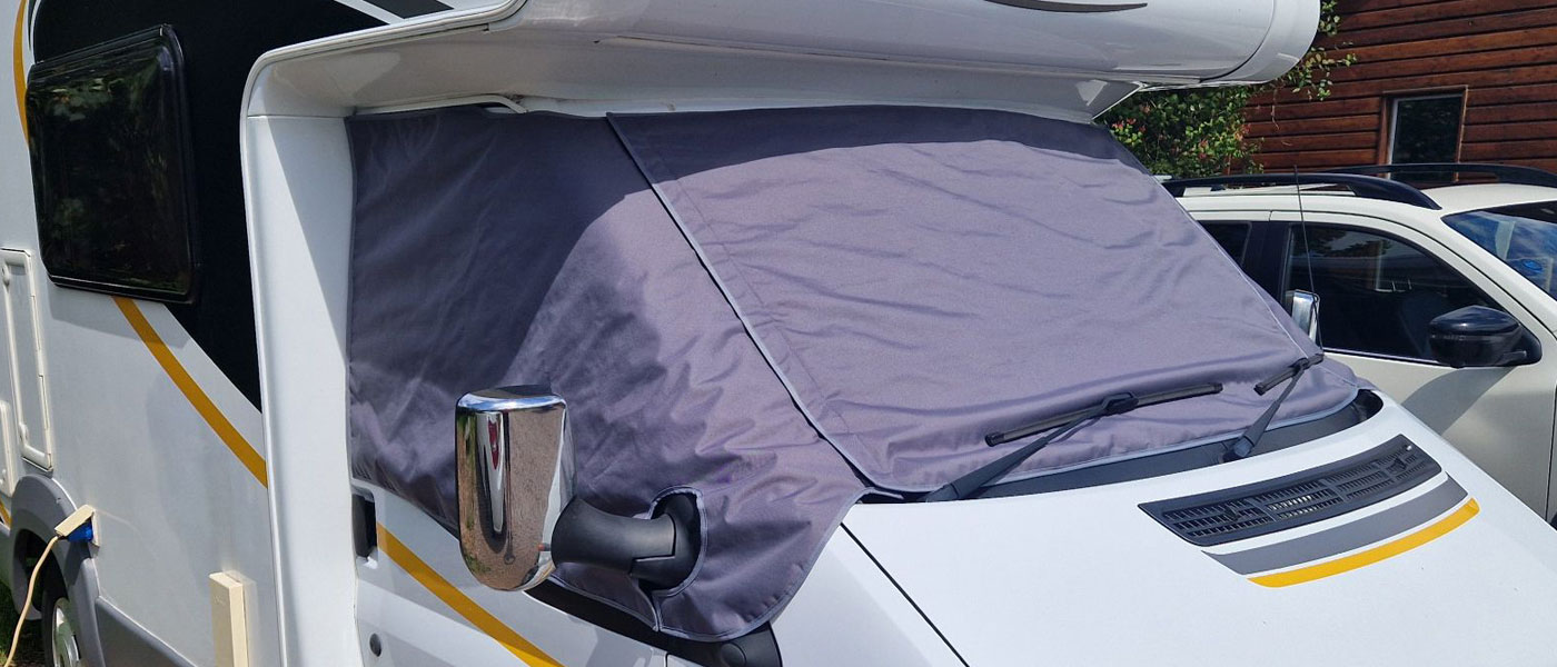 Grey Standard Screen Cover fitted to a Ford Transit based motorhome.